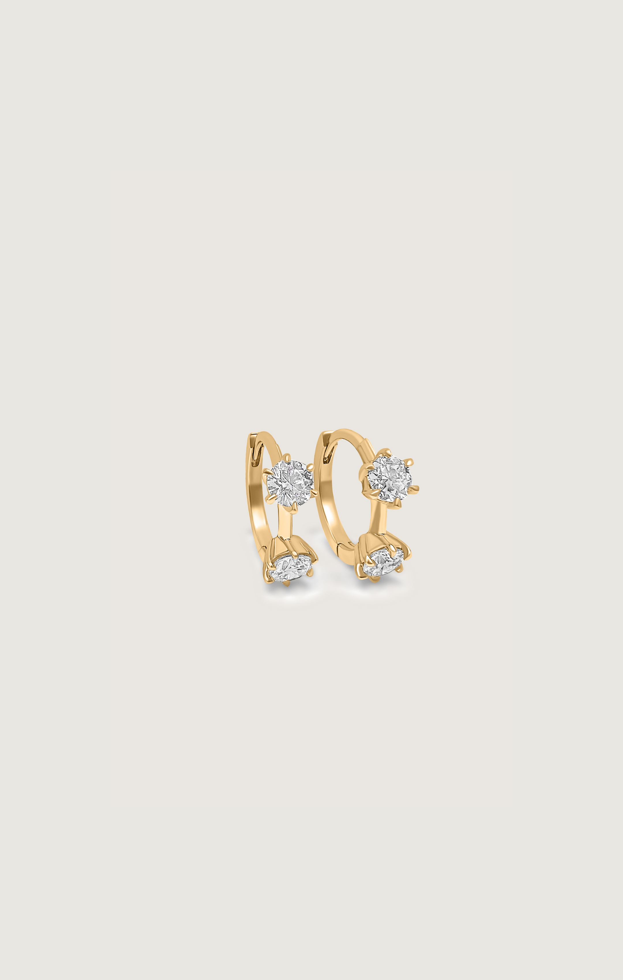 COMSO HUGGIES - DIAMOND TWO-STONED YELLOW GOLD HUGGIE HOOP EARRINGS ...